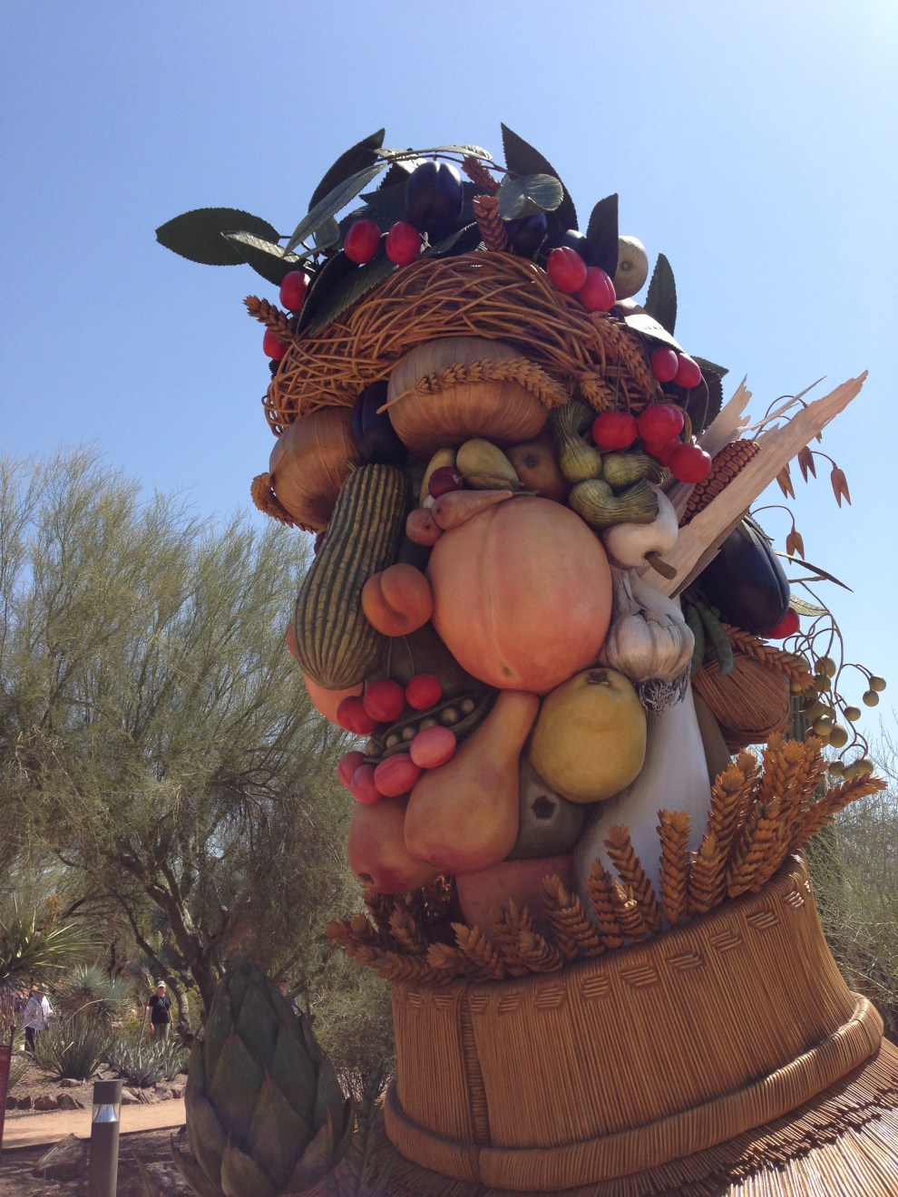 woman plant sculpture
